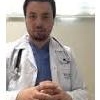 Dr. Erman Tamel