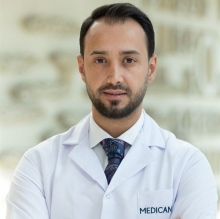 Op. Dr. Erhan Hüseyin Cömert