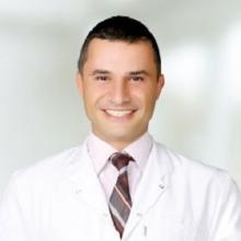 Op. Dr. Akgün Sayar